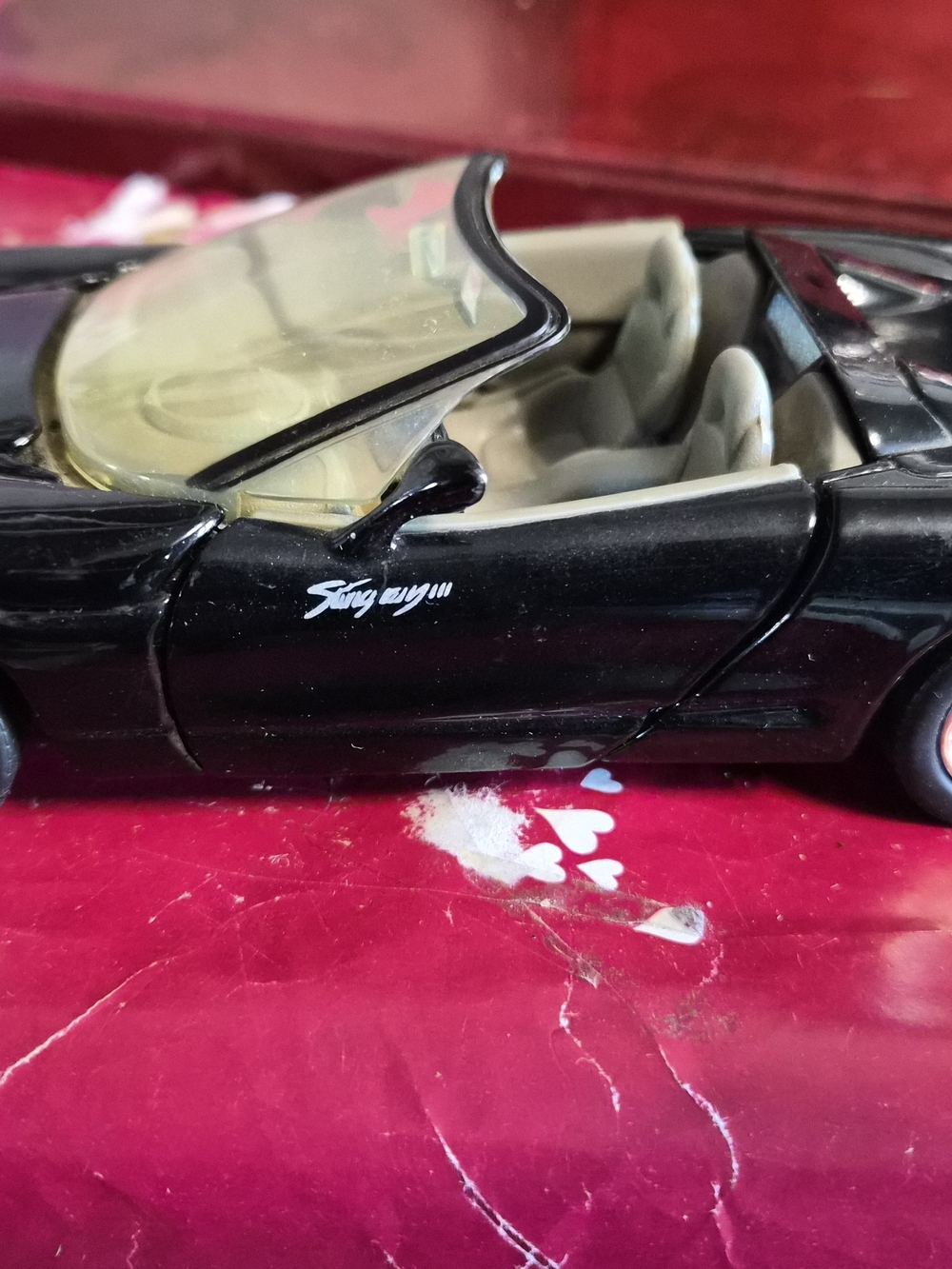Black Convertible Toy Car with 'Stay Away' Decal